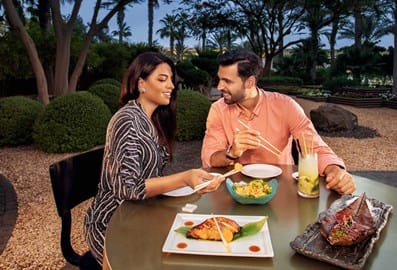 Couple dining at restaurant in Dubai