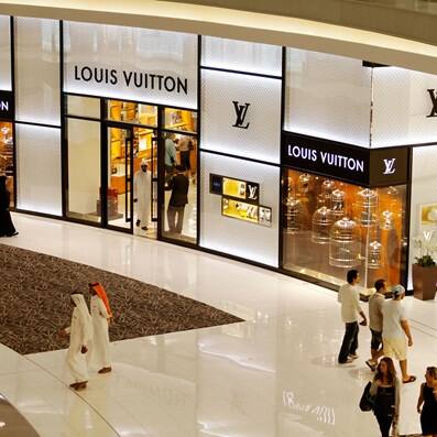 Louis Vuitton Shop With Shoppers Stock Photo - Download Image Now